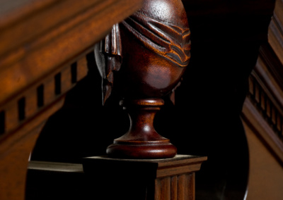 hand-carved finial - same bombe secretary