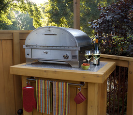 Kalamazoo Outdoor Gourmet’s Outdoor Artisan Pizza Oven conveniently sits on a countertop.
