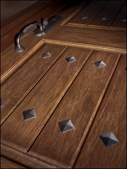 Peachtree Doors and Windows Rustic Collection, a plank-style, alder-grain entry door in low-maintenance, energy-efficient fiberglass.