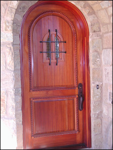 Mahogany half circle top exterior 2-panel door with custom 