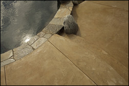 Concrete can also be stained and textured to create an anti-slip surface around pools. Photo courtesy of Life Deck Specialty Coatings in San Diego.