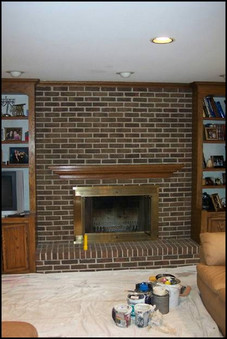 BEFORE. This washed-out fireplace has no pizazz. Faux painting and a refinished mantle subtly enhances the bricks, offering more depth and character. Photo courtesy of Brick Transformers.