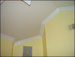 Even crazy angles are no match for the professional crown molding installer. Photo courtesy of T.F. Larkin, Inc.