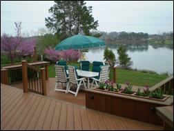 A railing system and lighting rounds out this alternative decking solution by Casa Decks.