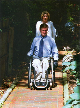 Accessible walks or paths should interconnect your outdoor spaces. This walk is constructed of mortared paving bricks set in a running bond pattern. Whenever possible, the path slope should not exceed a 5 percent incline, and the width should be generous to allow for wheelchair maneuvering.