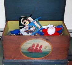 An old sea chest makes handy storage for out-of-season Christmas decorations.