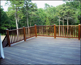 A wood deck requires regular sealing to prevent splitting and cracking. Back-brushing to distribute the stain or sealer evenly will give a level finish.